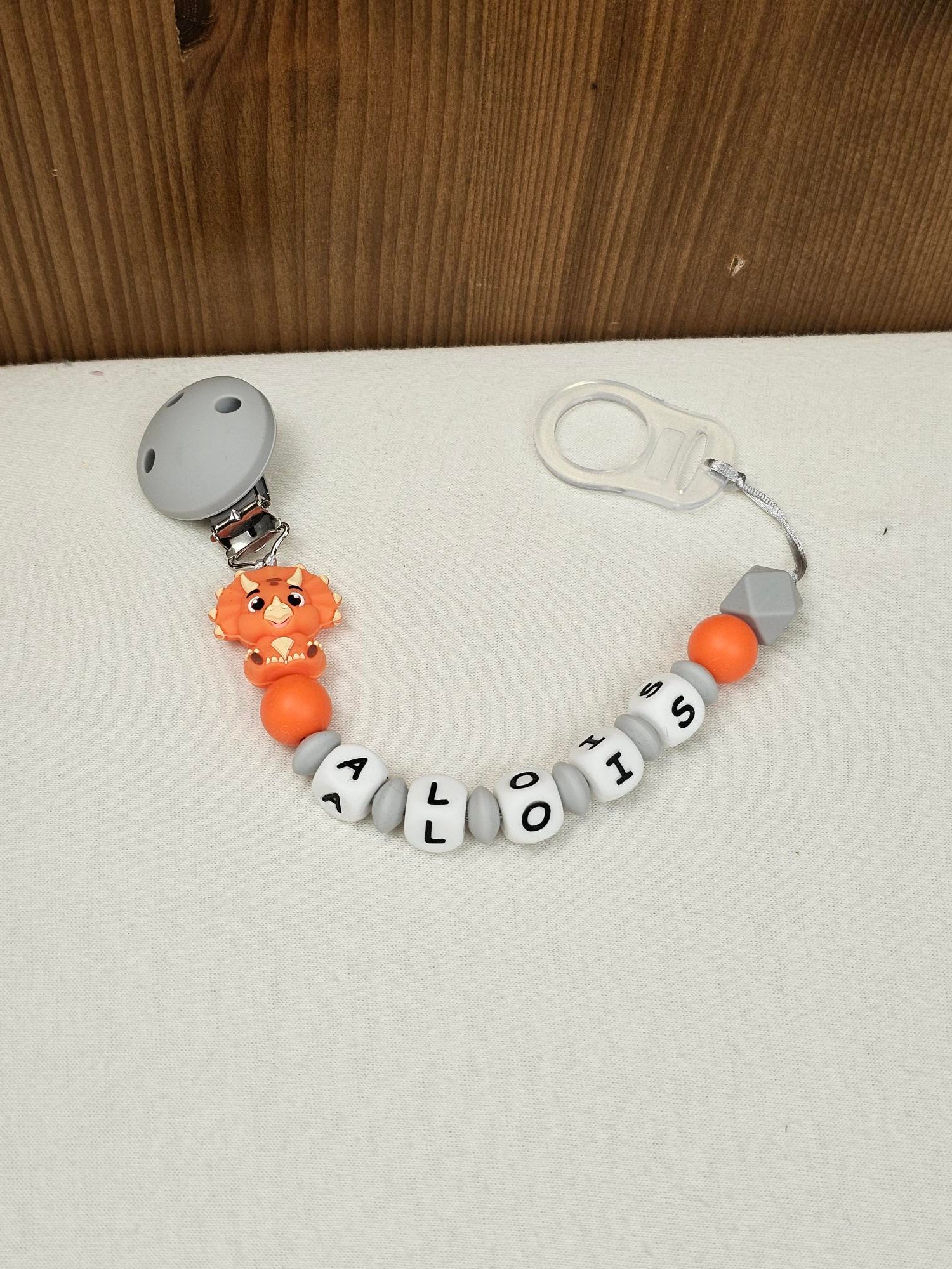 Attache Sucette A Perles En Silicone | Prénom Personnalisée | Triceratops Orange